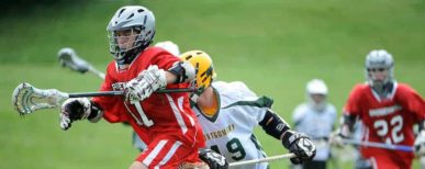 Lacrosse_Youth_Game A competitive game of boys' lacrosse. Maximize your team's potential with Lacrosse Scorebook+.